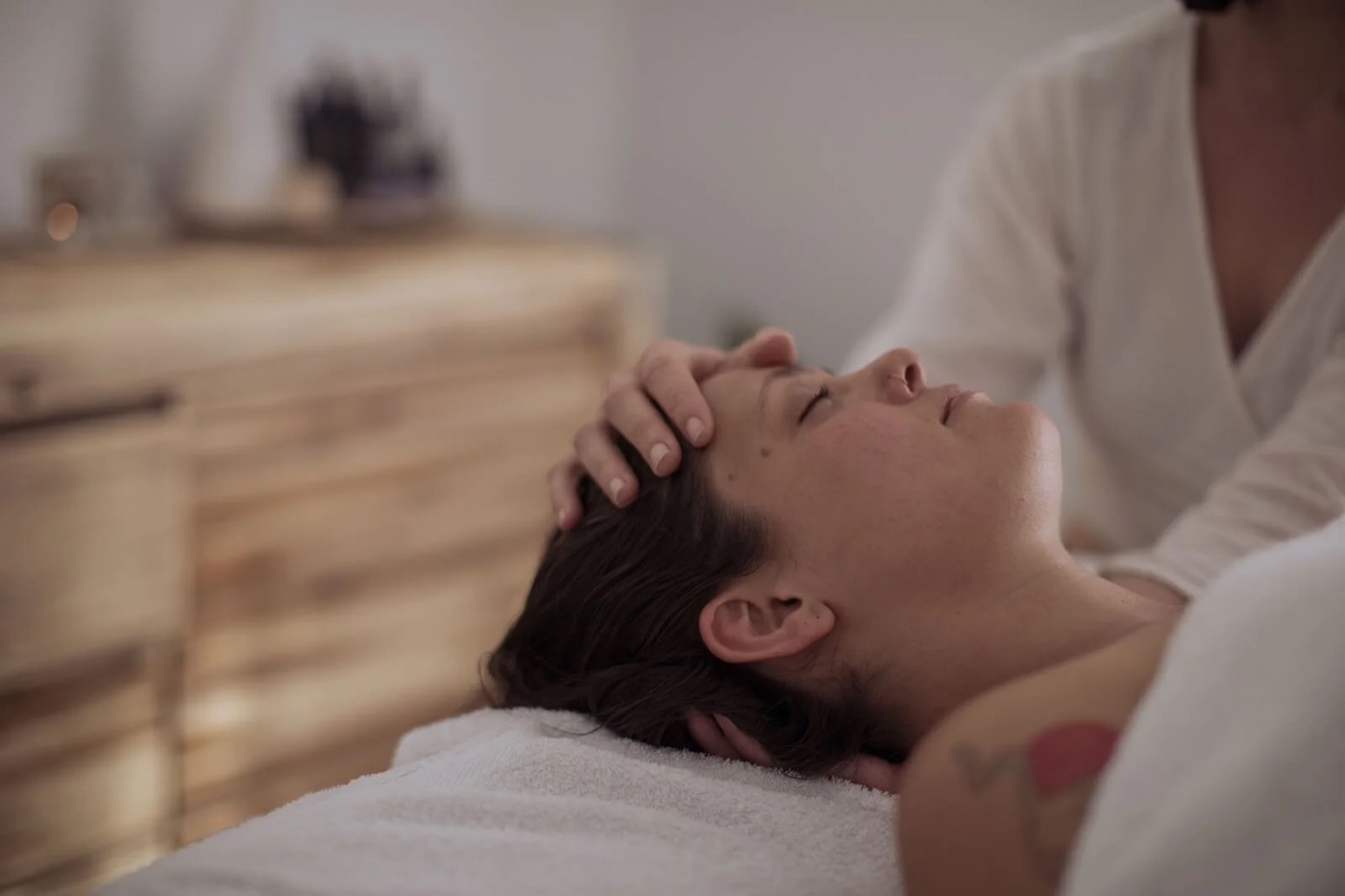Gentle craniosacral hold during a session